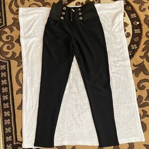 Black zip-up High-Waisted Pants with Button Detail